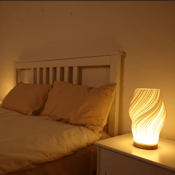 Skulpturale dimmbare LED-Tischlampe