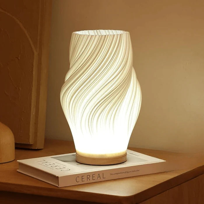 Skulpturale dimmbare LED-Tischlampe